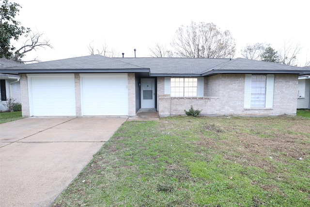 7706 Garsee Dr, Houston, TX 77040 - ranch-style house featuring an attached garage, brick siding, concrete driveway, and a front lawn