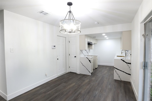 7706 Garsee Dr, Houston, TX 77040 - unfurnished dining area featuring dark wood-style flooring, a chandelier, and recessed lighting