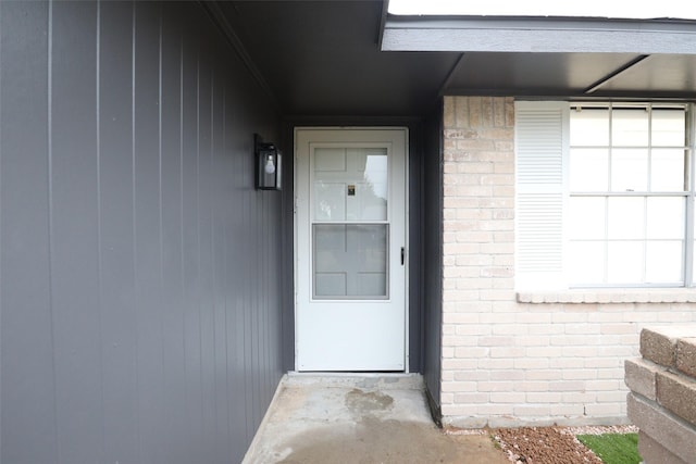7706 Garsee Dr, Houston, TX 77040 - view of exterior entry featuring brick siding