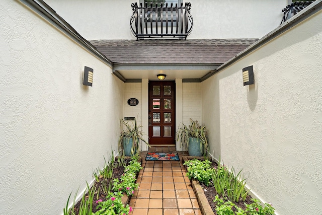 1213 Archley Dr, Hilshire Village, TX 77055 - property entrance with a shingled roof and stucco siding