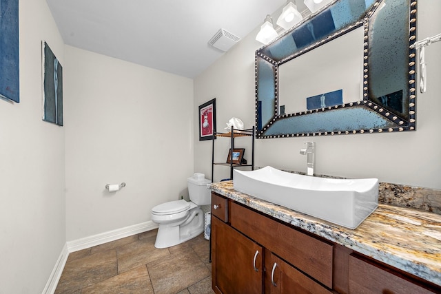 1213 Archley Dr, Hilshire Village, TX 77055 - bathroom with vanity and stone finish floors