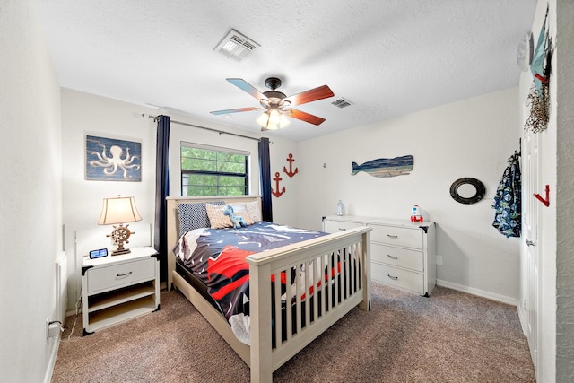 1213 Archley Dr, Hilshire Village, TX 77055 - bedroom featuring carpet flooring, ceiling fan, and a textured ceiling