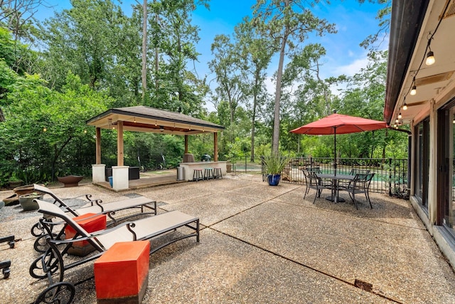 1213 Archley Dr, Hilshire Village, TX 77055 - view of patio with view of scattered trees