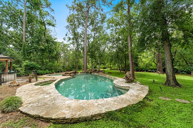 1213 Archley Dr, Hilshire Village, TX 77055 - view of pool featuring a lawn, a gazebo, and a pool with connected hot tub