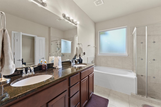 24506 Rossmore Hill Ct, Spring, TX 77389 - full bathroom with a bath, a shower stall, double vanity, and tile patterned flooring
