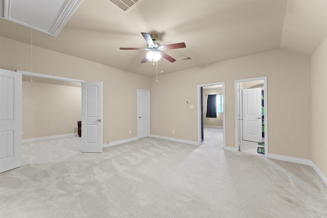 24506 Rossmore Hill Ct, Spring, TX 77389 - unfurnished bedroom with attic access, light carpet, vaulted ceiling, and a ceiling fan