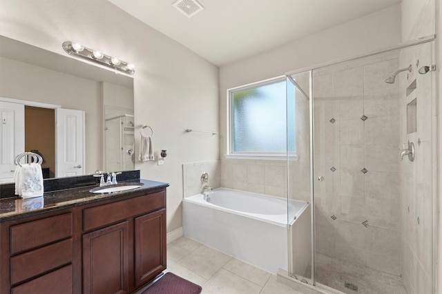 24506 Rossmore Hill Ct, Spring, TX 77389 - full bathroom with a bath, a stall shower, tile patterned floors, and vanity