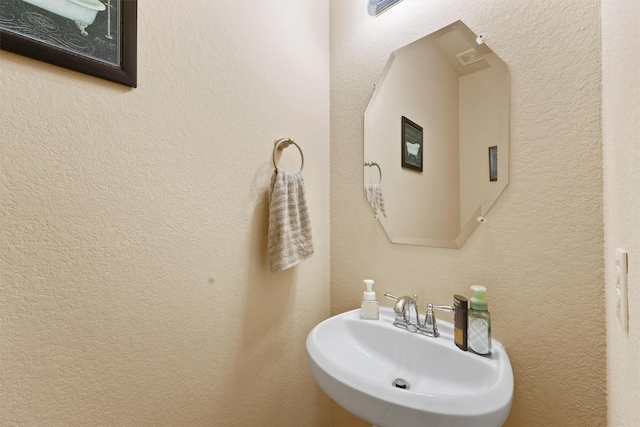 24506 Rossmore Hill Ct, Spring, TX 77389 - bathroom with a textured wall
