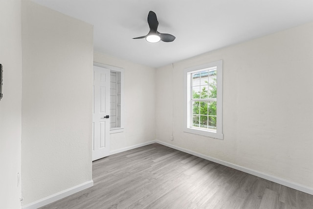 4715 Engleford St, Houston, TX 77026 - spare room featuring wood finished floors and a ceiling fan