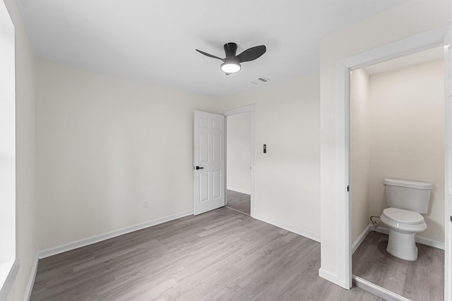 4715 Engleford St, Houston, TX 77026 - unfurnished bedroom with wood finished floors and ceiling fan