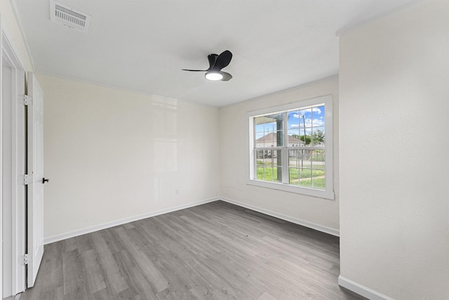 4715 Engleford St, Houston, TX 77026 - spare room featuring wood finished floors and ceiling fan