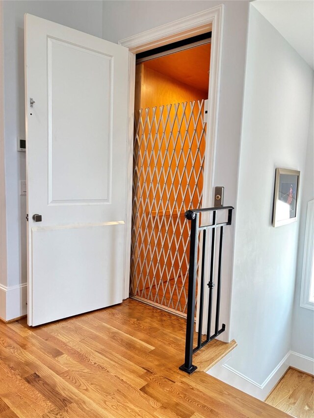 7119 Janet St, Houston, TX 77055 - elevator with wood finished floors and baseboards