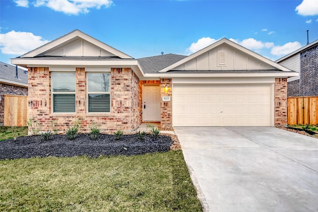 9603 Fulvetta Briar Ct, Baytown, TX 77521 - ranch-style house with board and batten siding, brick siding, driveway, and a garage