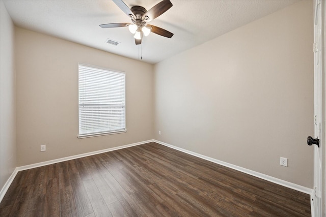 2219 Fenton Rock Ln, Katy, TX 77494 - spare room featuring dark wood-style flooring and ceiling fan