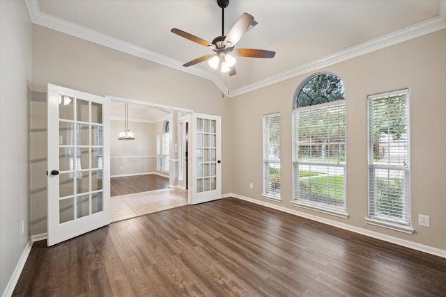 2219 Fenton Rock Ln, Katy, TX 77494 - unfurnished room featuring french doors, wood finished floors, ornamental molding, a chandelier, and ceiling fan