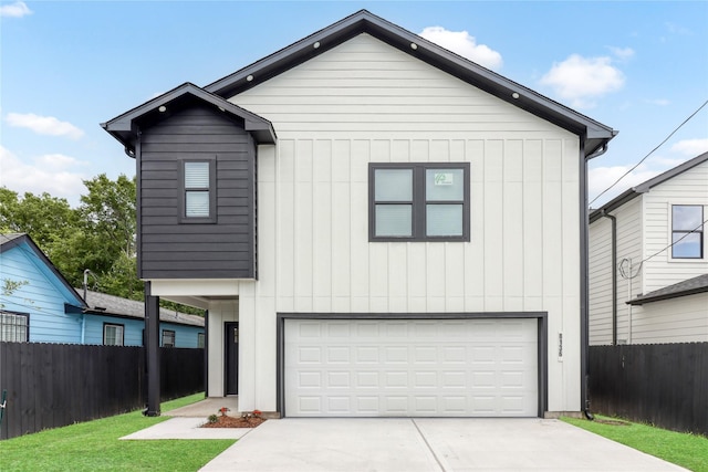 8136 Chateau St, Houston, TX 77028 - view of front of home featuring an attached garage and driveway