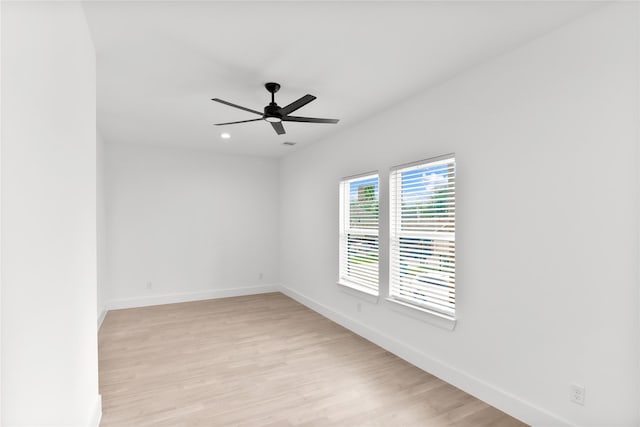 8136 Chateau St, Houston, TX 77028 - spare room with a ceiling fan, light wood finished floors, and recessed lighting