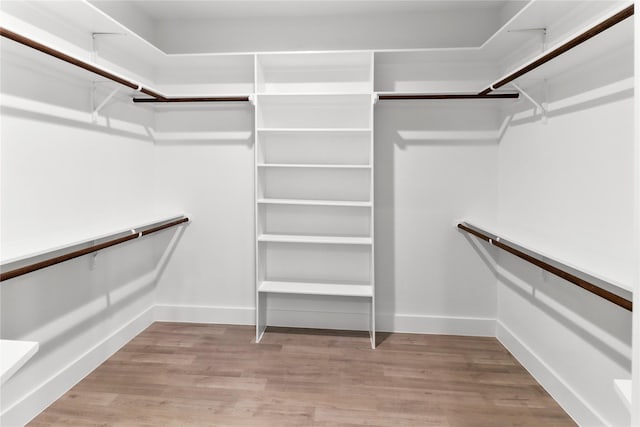 8136 Chateau St, Houston, TX 77028 - walk in closet featuring wood finished floors