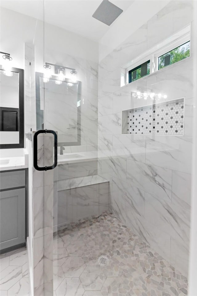 8136 Chateau St, Houston, TX 77028 - bathroom featuring a marble finish shower and vanity