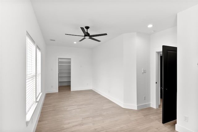 8136 Chateau St, Houston, TX 77028 - spare room with ceiling fan, light wood finished floors, and recessed lighting