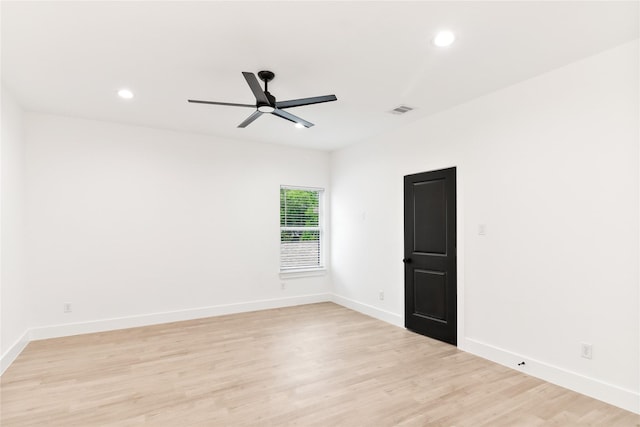 8136 Chateau St, Houston, TX 77028 - spare room featuring a ceiling fan, light wood finished floors, and recessed lighting