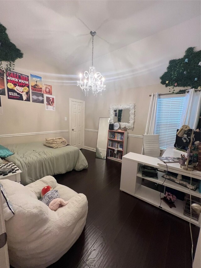 6315 Oakmont Creek Dr, Spring, TX 77379 - bedroom with wood finished floors and a chandelier