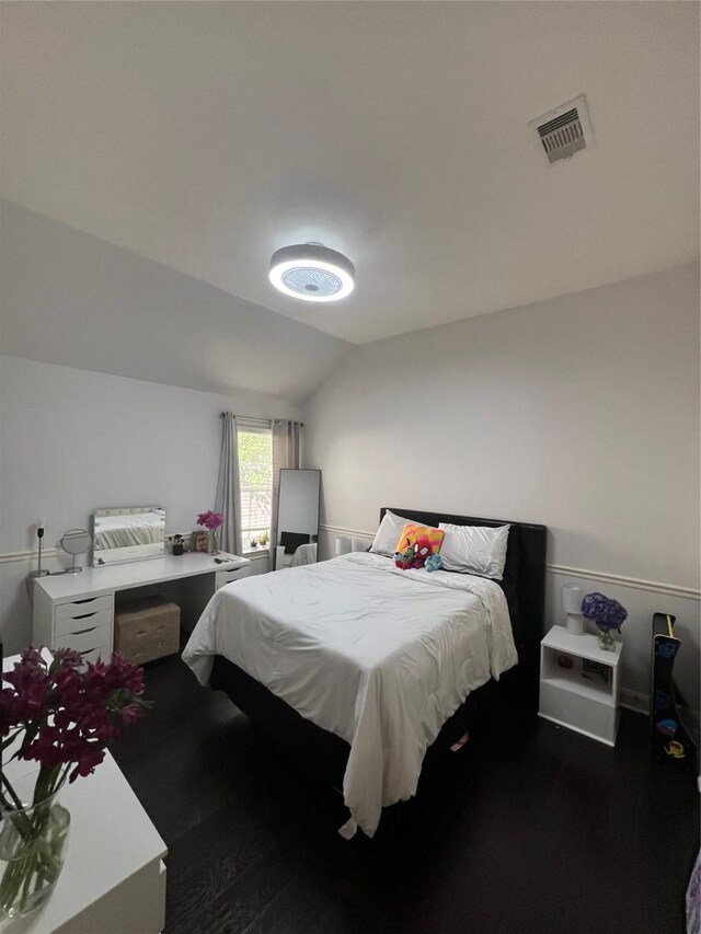 6315 Oakmont Creek Dr, Spring, TX 77379 - bedroom featuring lofted ceiling and wood finished floors