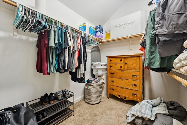12747 Bridle Springs Ln, Houston, TX 77044 - walk in closet featuring carpet and vaulted ceiling