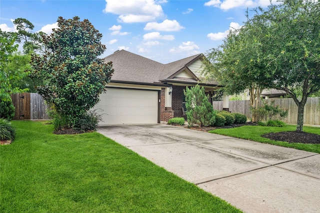 12747 Bridle Springs Ln, Houston, TX 77044 - view of front facade with an attached garage, concrete driveway, brick siding, and a shingled roof