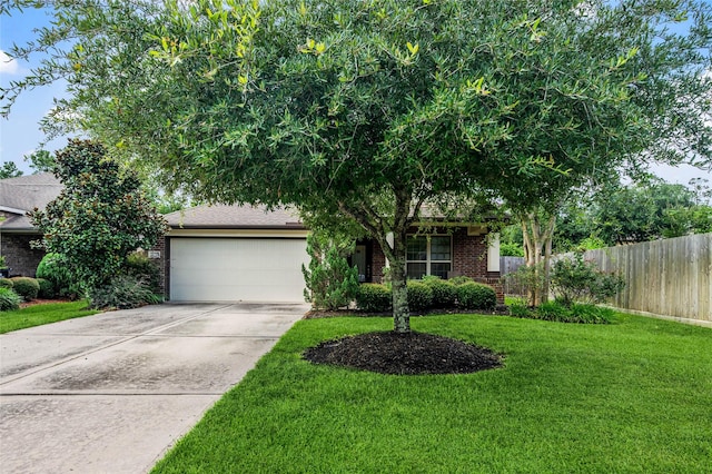 12747 Bridle Springs Ln, Houston, TX 77044 - view of property hidden behind natural elements with a garage, brick siding, and driveway