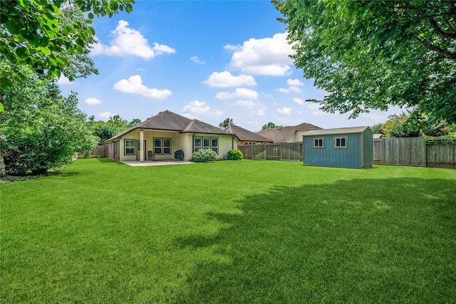 12747 Bridle Springs Ln, Houston, TX 77044 - rear view of property with a patio area, a fenced backyard, and a shed
