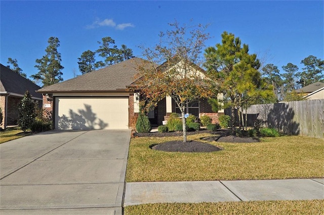 12747 Bridle Springs Ln, Houston, TX 77044 - view of front of property with an attached garage, concrete driveway, and brick siding