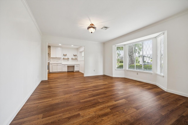 5707 Darnell St, Houston, TX 77096 - unfurnished living room with dark wood-type flooring and crown molding
