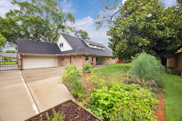 5707 Darnell St, Houston, TX 77096 - view of front facade featuring brick siding, a garage, roof with shingles, and driveway