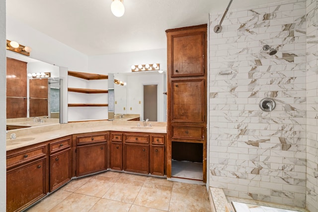 902 Mesa Terrace Dr, Katy, TX 77450 - full bathroom featuring double vanity, tiled shower, and tile patterned floors