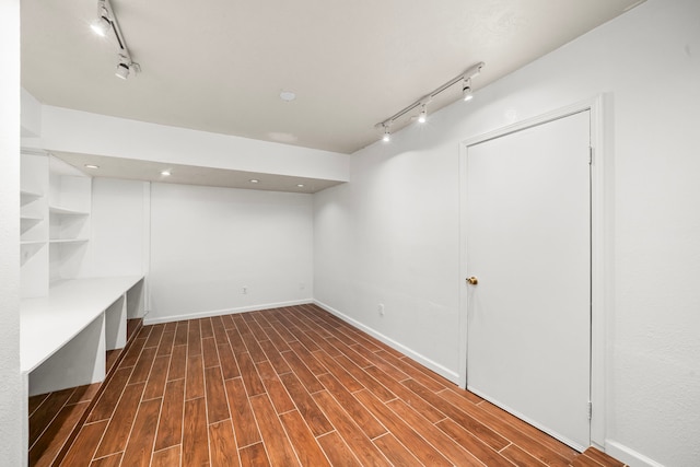 902 Mesa Terrace Dr, Katy, TX 77450 - below grade area with track lighting, dark wood-style flooring, and recessed lighting
