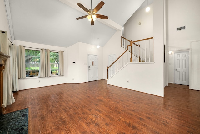 902 Mesa Terrace Dr, Katy, TX 77450 - unfurnished living room featuring high vaulted ceiling, ceiling fan, stairway, and wood finished floors