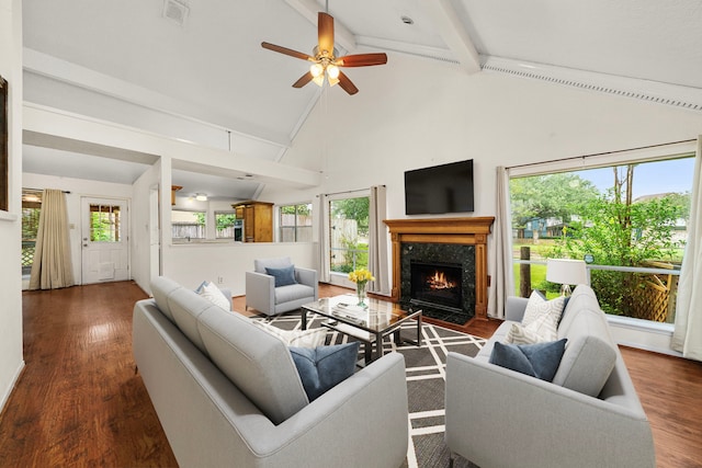 902 Mesa Terrace Dr, Katy, TX 77450 - living area with high vaulted ceiling, a high end fireplace, beam ceiling, healthy amount of natural light, and a ceiling fan