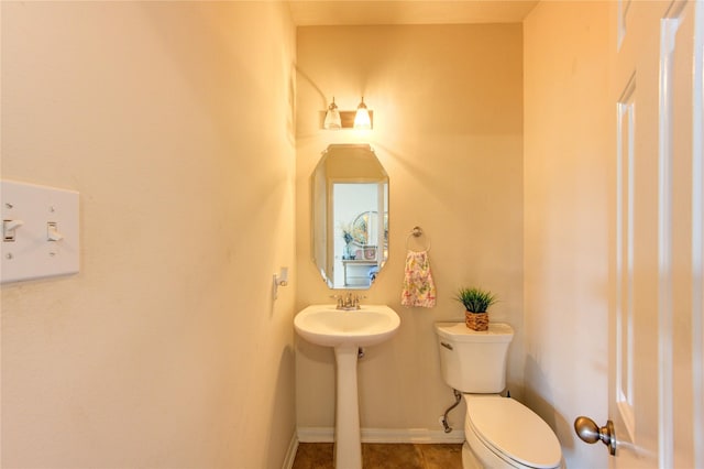24811 Corbin Gate Dr, Spring, TX 77389 - half bathroom with toilet and tile patterned floors