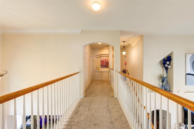 24811 Corbin Gate Dr, Spring, TX 77389 - hallway featuring arched walkways, carpet, and crown molding