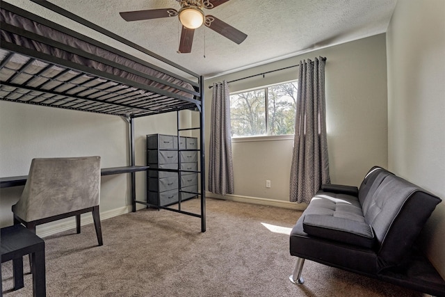 24203 Creekview Dr, Spring, TX 77389 - bedroom with carpet flooring, a textured ceiling, and a ceiling fan