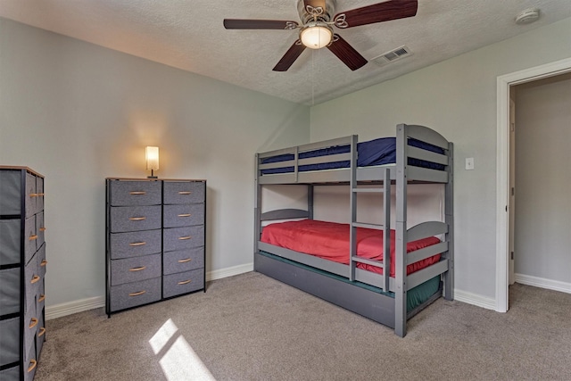 24203 Creekview Dr, Spring, TX 77389 - bedroom featuring carpet, a textured ceiling, and ceiling fan