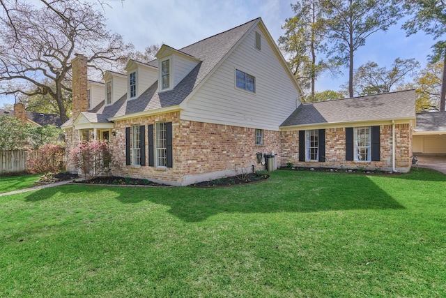 24203 Creekview Dr, Spring, TX 77389 - back of property featuring brick siding, a chimney, and a shingled roof