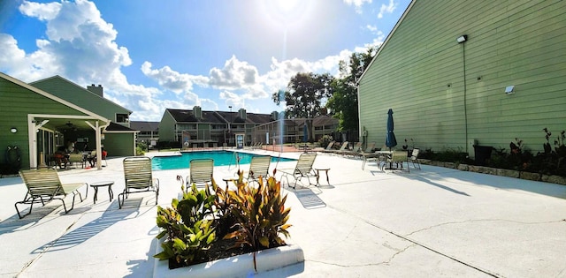14777 Wunderlich Dr Unit 605, Houston, TX 77069 - community pool featuring a patio