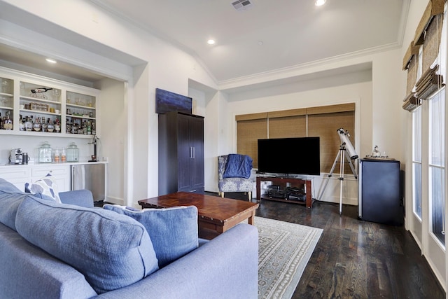 5218 Crawford St, Houston, TX 77004 - living room featuring a dry bar, ornamental molding, dark wood finished floors, lofted ceiling, and recessed lighting