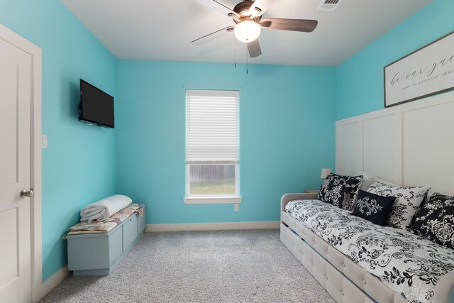 1803 Twin Oaks Cir, Brenham, TX 77833 - carpeted bedroom featuring baseboards and ceiling fan