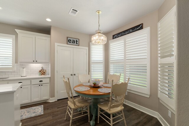 1803 Twin Oaks Cir, Brenham, TX 77833 - dining space featuring dark wood-type flooring, a chandelier, and recessed lighting
