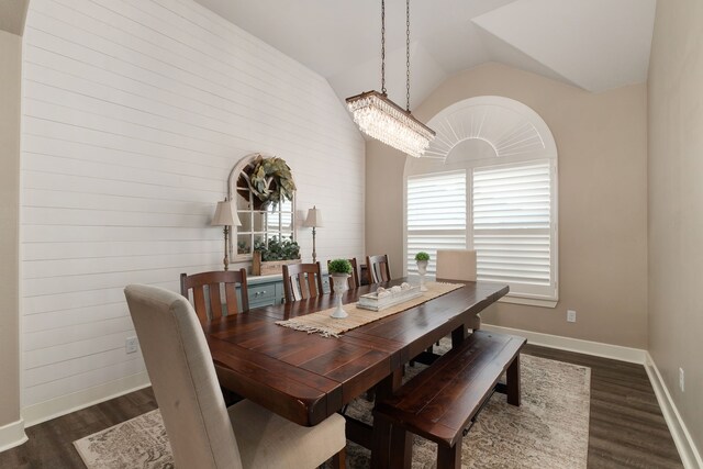 1803 Twin Oaks Cir, Brenham, TX 77833 - dining room featuring dark wood-style floors, vaulted ceiling, and a chandelier