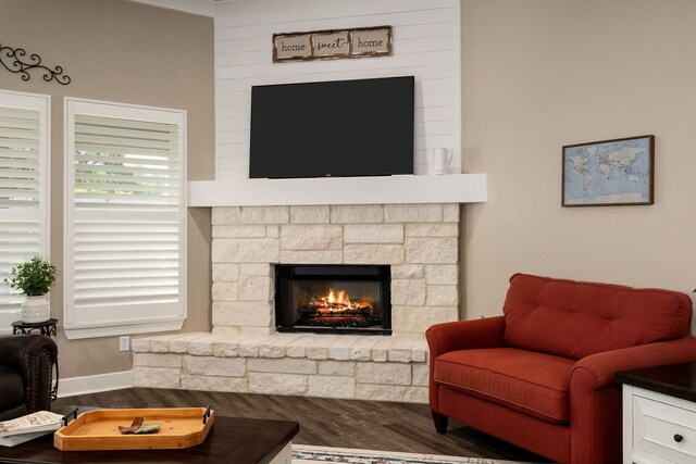 1803 Twin Oaks Cir, Brenham, TX 77833 - living room with wood finished floors and a fireplace