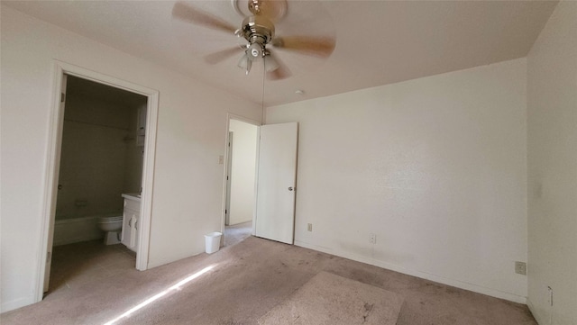1557 Bonanza Rd Unit 557, Houston, TX 77062 - unfurnished bedroom with light carpet, ensuite bath, and ceiling fan